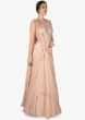 Seashell pink gown in twisted drape with embroidered bodice only on Kalki