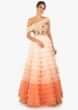 Shaded peach gown featuring in 3 D flowers and resham embroidery  only on Kalki