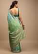 Shaded Green And Turquoise Saree In Georgette With Woven Floral Jaal And Sequins Embellishments