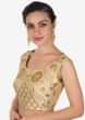 Shimmer blouse in light gold adorn in kundan embroidery only on Kalki