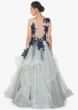 Sleveless smoke grey net gown with knife pleated layered look complimented with black navi blue floral bodice  only on kalki