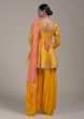 Sun Yellow Salwar Suit With Peplum Kurti Enhanced With Brocade Floral Buttis  
