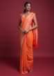 Tangerine Orange Saree In Georgette With Weaved Buttis And Coral Pallu And Border