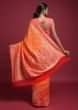 Tangerine Orange Saree In Georgette With Weaved Buttis And Coral Pallu And Border