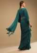 Teal Blue Saree In Georgette With Ruffle Frill, Bishop Sleeves Crop Top And A Chunky Embroidered Belt  