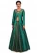 Teal green lehenga with neckline embroidered jacket only on Kalki