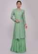 Turq green suit paired with matching sharara pant and chiffon dupatta 