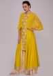Tuscan yellow suit with additional chiffon layer paired with cream palazzo 