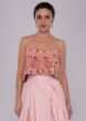 Velvet strap crop top paired with pastel pink flared skirt with slit 