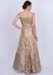 Vintage beige hard net lehenga adorn with self lurex patch work in embroidery and butti only on Kalki