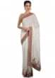 White georgette saree adorned with sequins and zari work only on Kalki