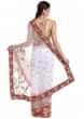 White net saree adorned with sequins and zardosi craft only on Kalki