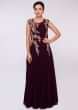 Wine lycra net gown with floral embroidered bodice