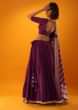 Wine Purple Lehenga In Brocade Silk With Woven Bandhani Design And Unstitched Blouse 