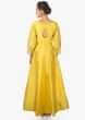 Yellow anarkali suit with cold shoulder and embroidered sleeve only on Kalki