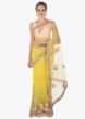 Yellow net saree in 3D flower with velvet patch 