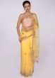 Yellow organza saree with embroidered butti and border