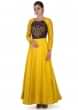 Yellow Silk Dress Styled with a Wine Raw Silk Bodice Featuring Zardosi Work only on Kalki
