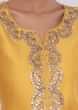Yellow suit with white sharara and net dupatta only on Kalki