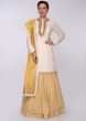 Yellow Lehenga Embroidered In Thread And Paired With White Kurti Online - Kalki Fashion
