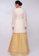Yellow Lehenga Embroidered In Thread And Paired With White Kurti Online - Kalki Fashion