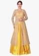 Yellow lehenga with beige jacket featuring the moti and cut dana embroidery work only on Kalki
