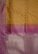 Yellow saree in zari butti along with brocade pallav only on Kalki