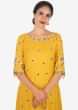 Yellow straight suit in cotton silk with resham and mirror embroidery only on Kalki