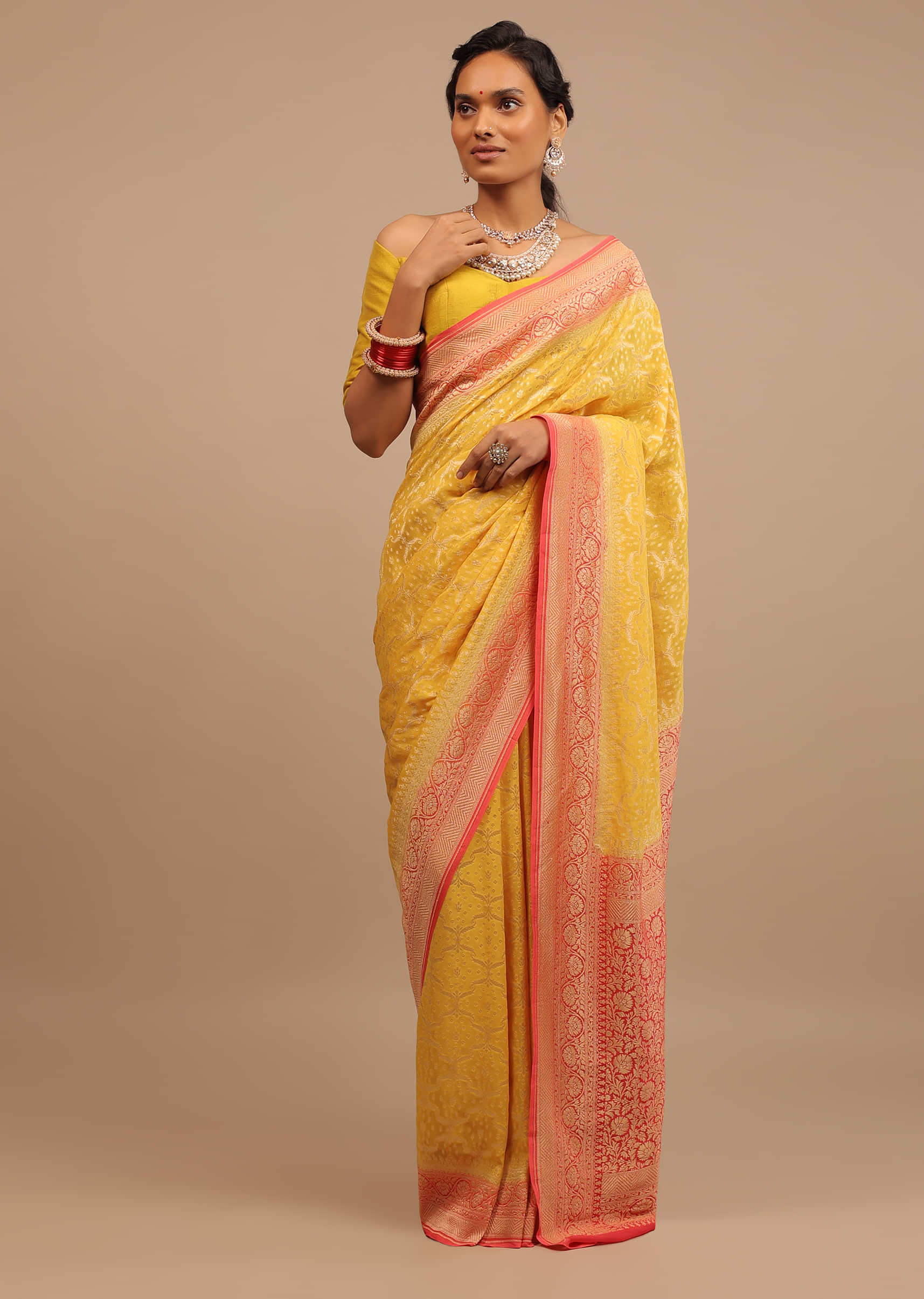Daffodil Yellow With Heavy Woven Brocade Work On Pink Border And Pallu