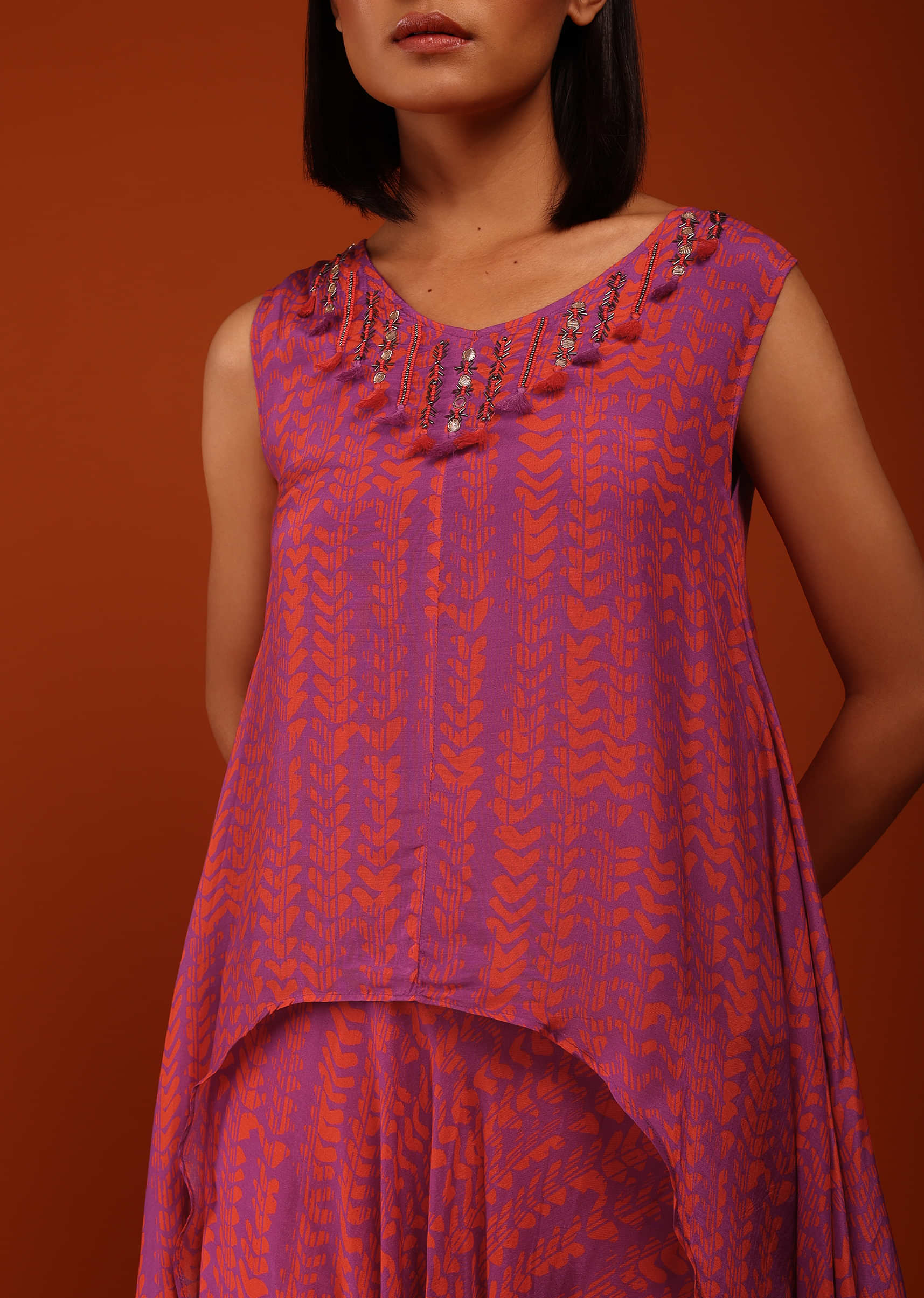 Dahlia Violet Digital Print Tunic Set In A V Neckline Sleeveless With The Matching Low Crotch Dhoti 