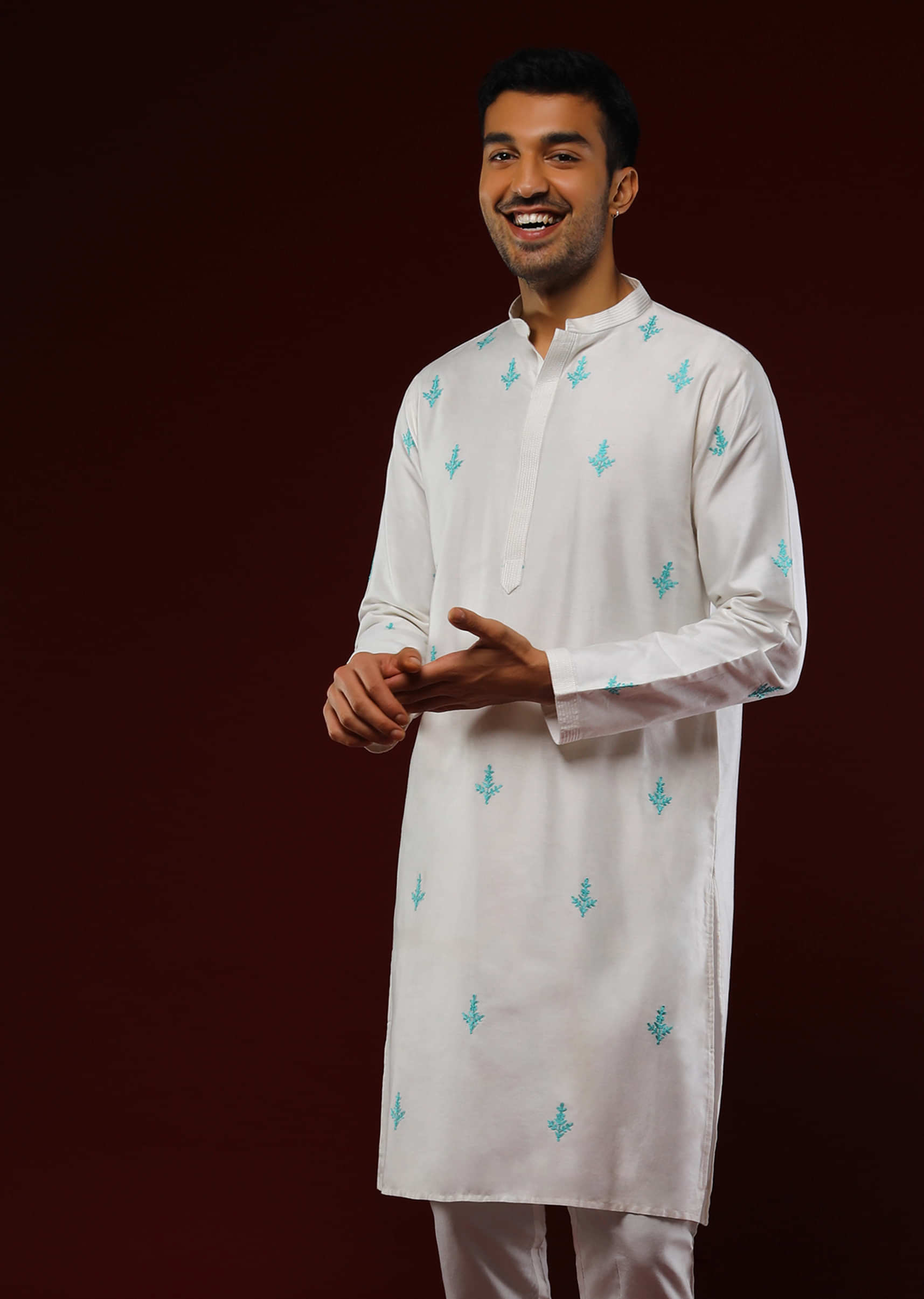 Daisy White Kurta Set In Cotton With Turquoise Resham Embroidered Buttis