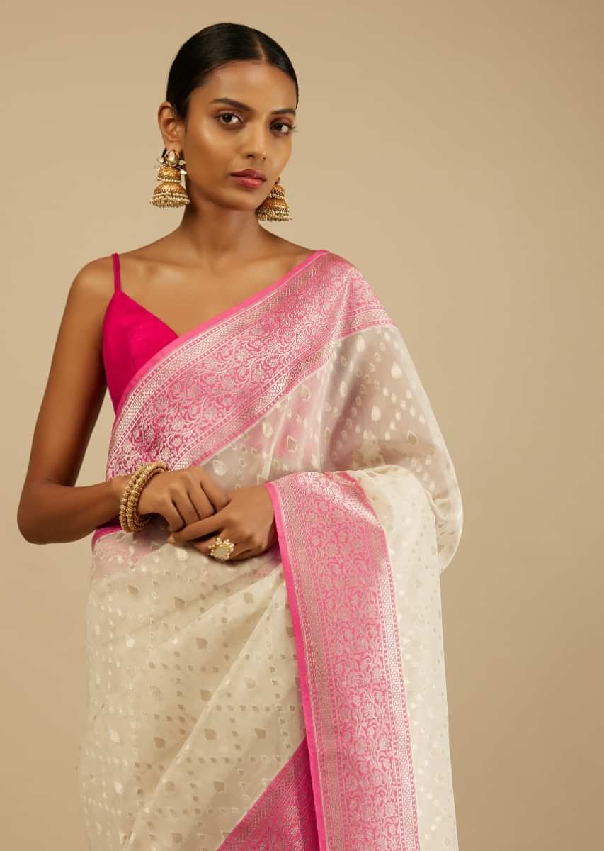 Daisy White Saree In Organza Silk With Brocade Woven Leaf Buttis Design And Unstitched Blouse  