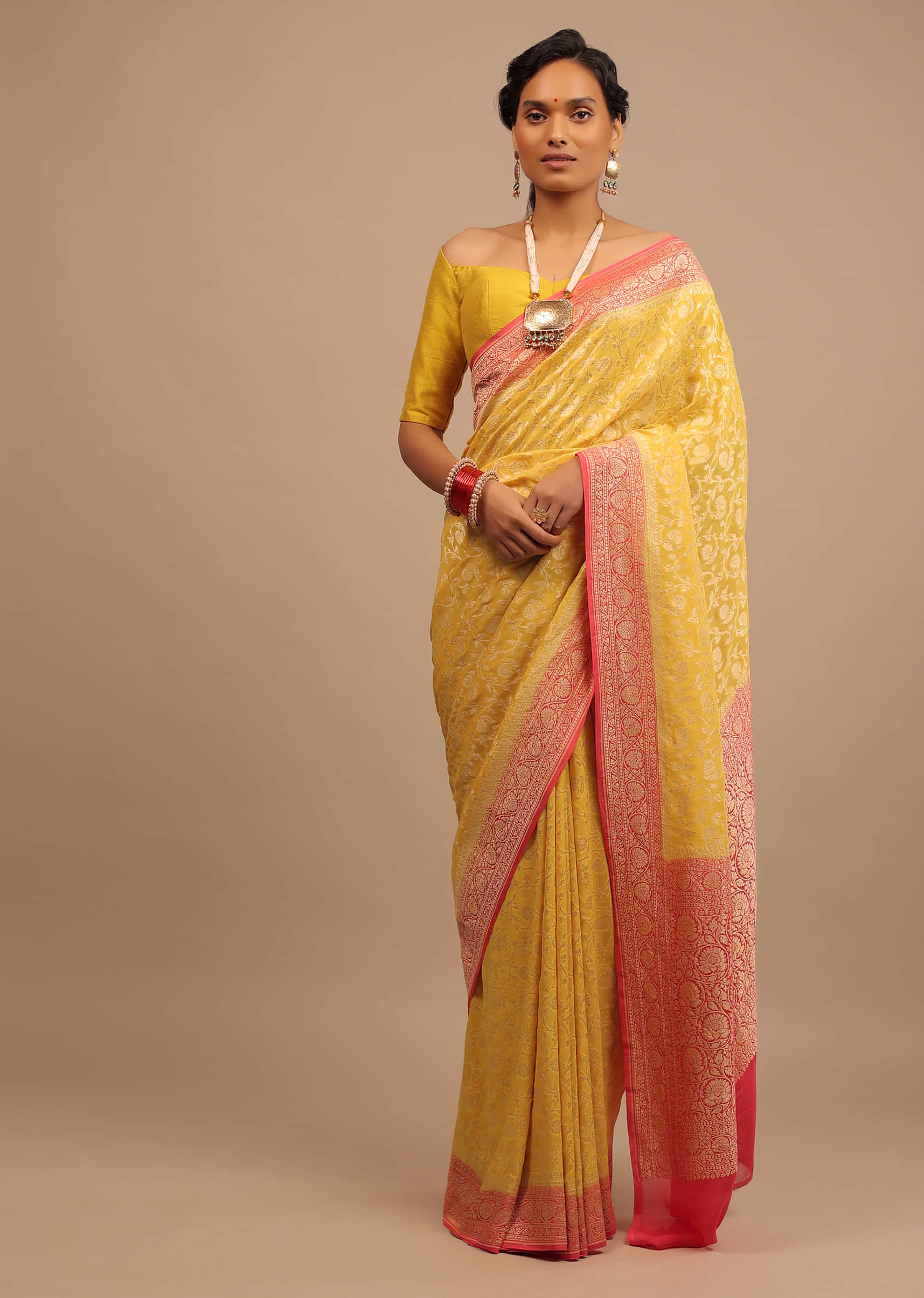 Dandelion Yellow Traditional Georgette Saree With Orange Brocade Border And Jaal Work 