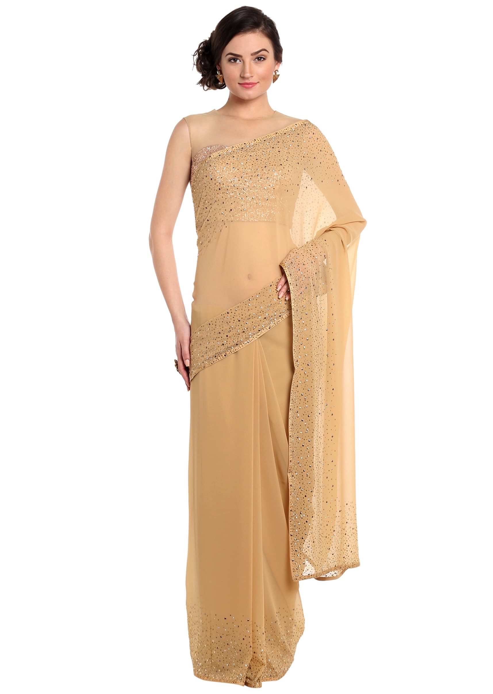 Dark beige saree adorn in gold and silver kundan embroidery only on Kalki