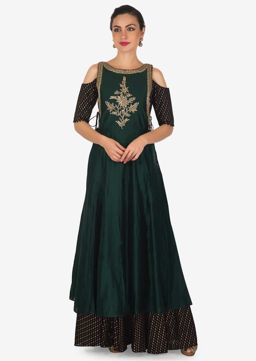 Black anarkali suit matched with dark green top layer adorn in cut dana and zardosi only on Kalki