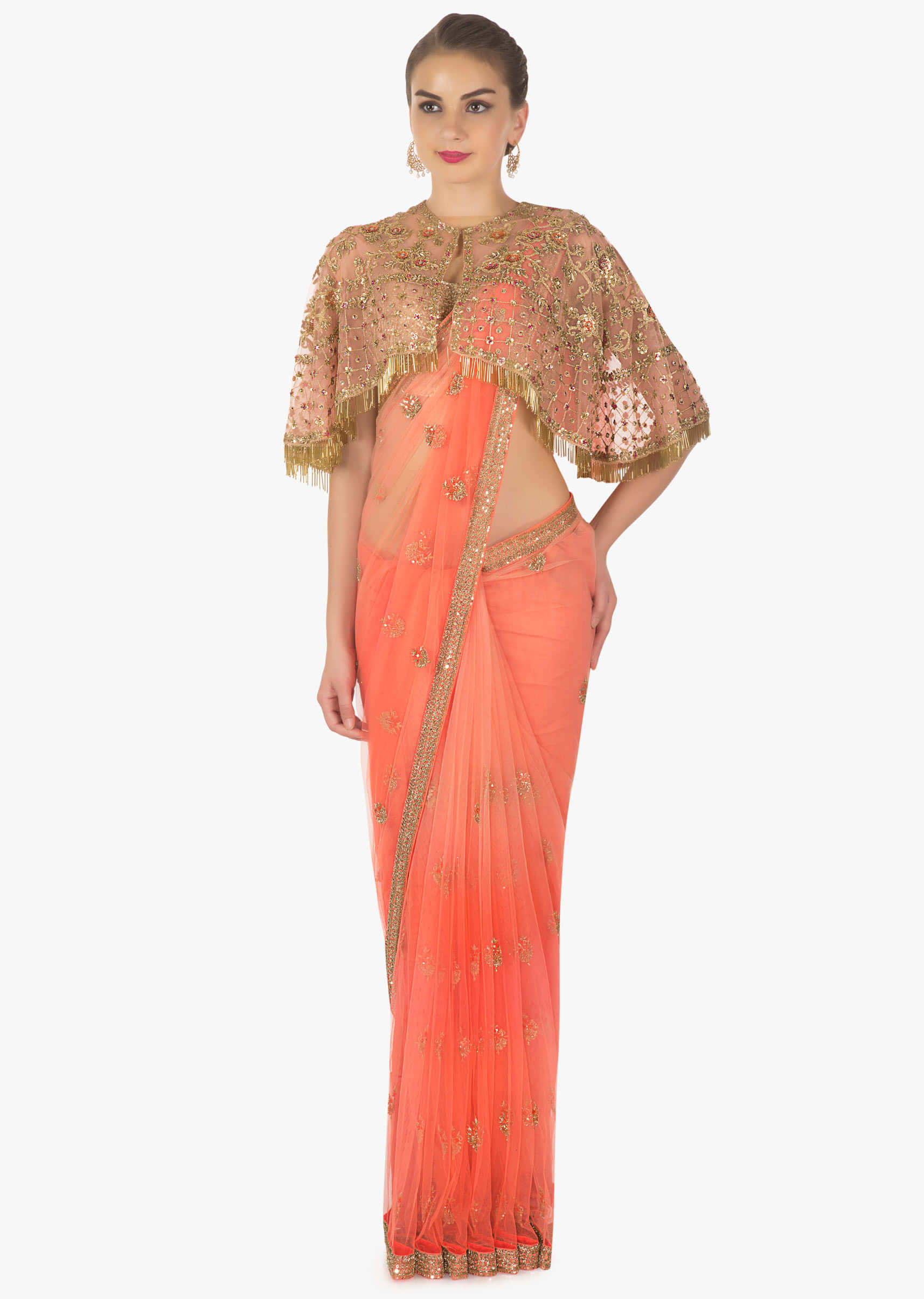 Dark peach net saree paired with a net embroidered cape