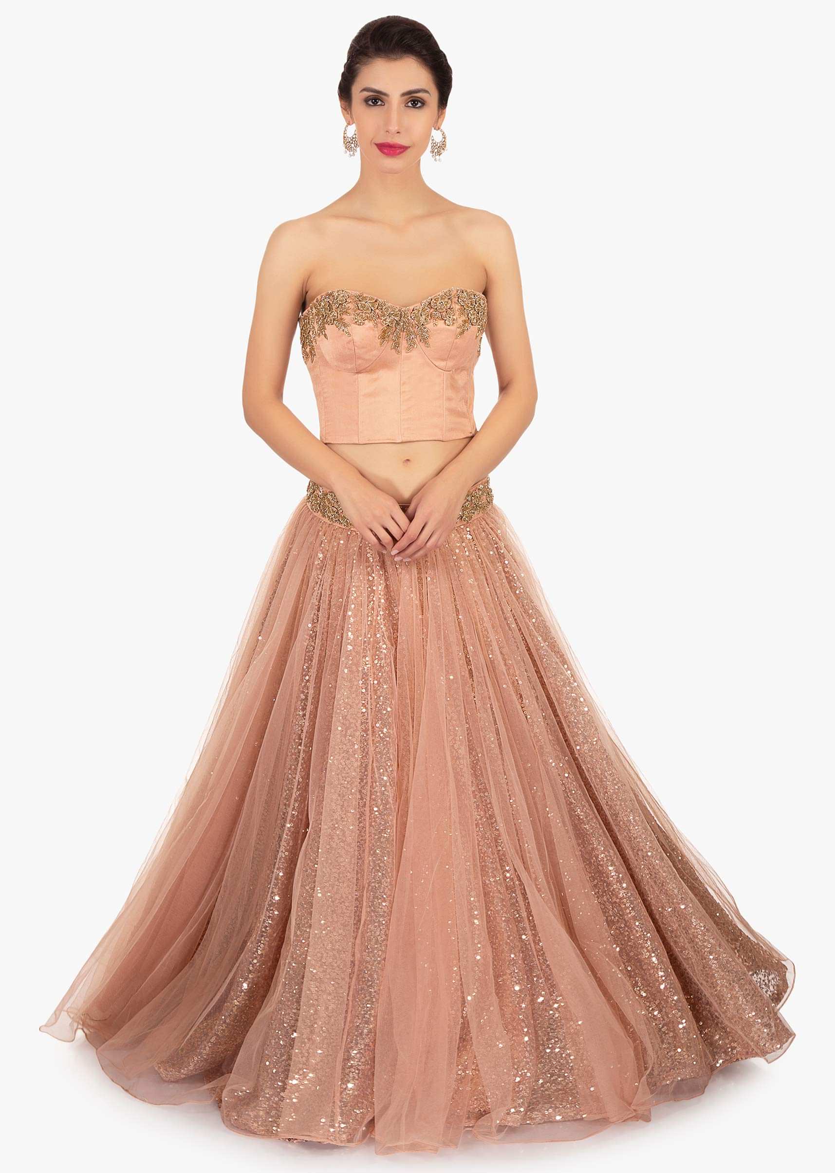 Dark peach strapless crop top paired with sequins fabric skirt