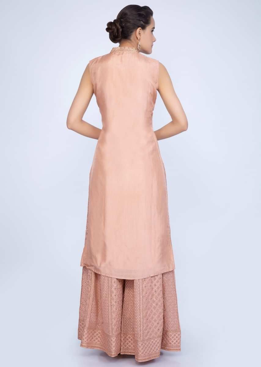 Dark peach suit with embroidered palazzo and chiffon dupatta only on Kalki
