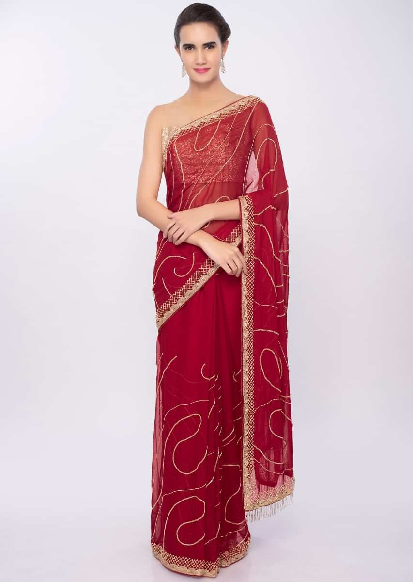 Dark red georgette saree in cut dana embroidery and butti only on Kalki