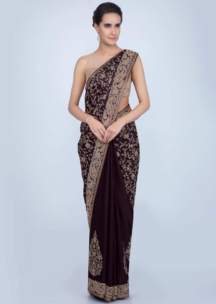Dark violet milano satin saree with heavy embroidered butti and border only on Kalki