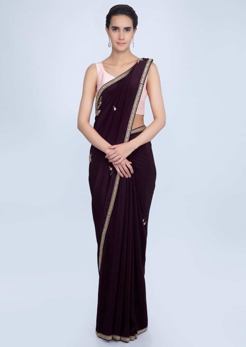 Dark violet satin crepe saree with embroidered butti and border only on Kalki