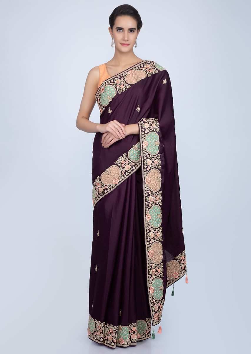 Dark violet silk saree with butti and heavy embroidered border only on Kalki