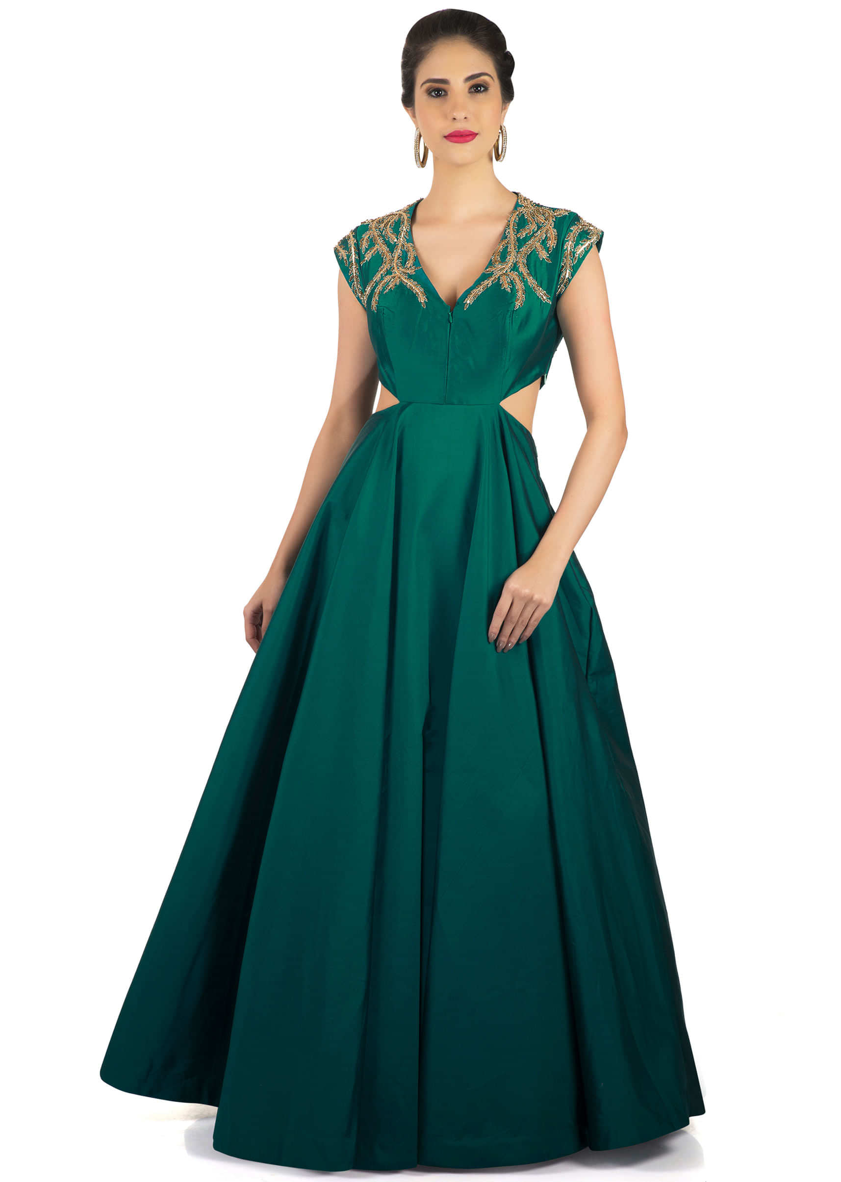 Dark green gown with cut out at wait and zari embroidery only on Kalki
