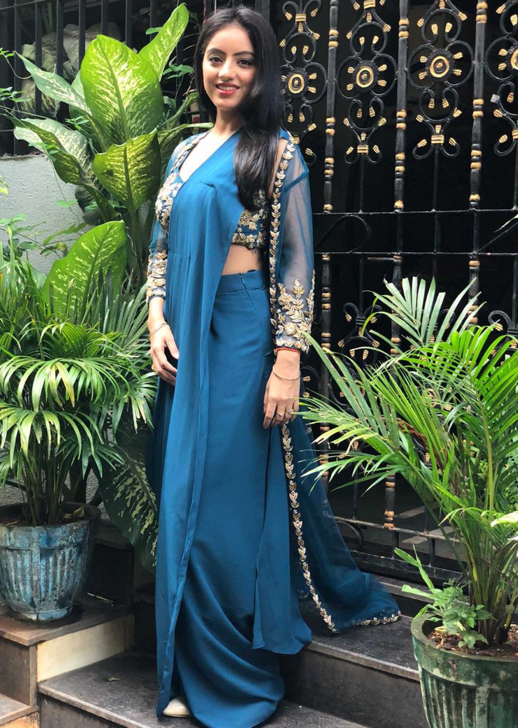 Deepika Singh in Kalki embroidered crop top with draped skirt and jacke 