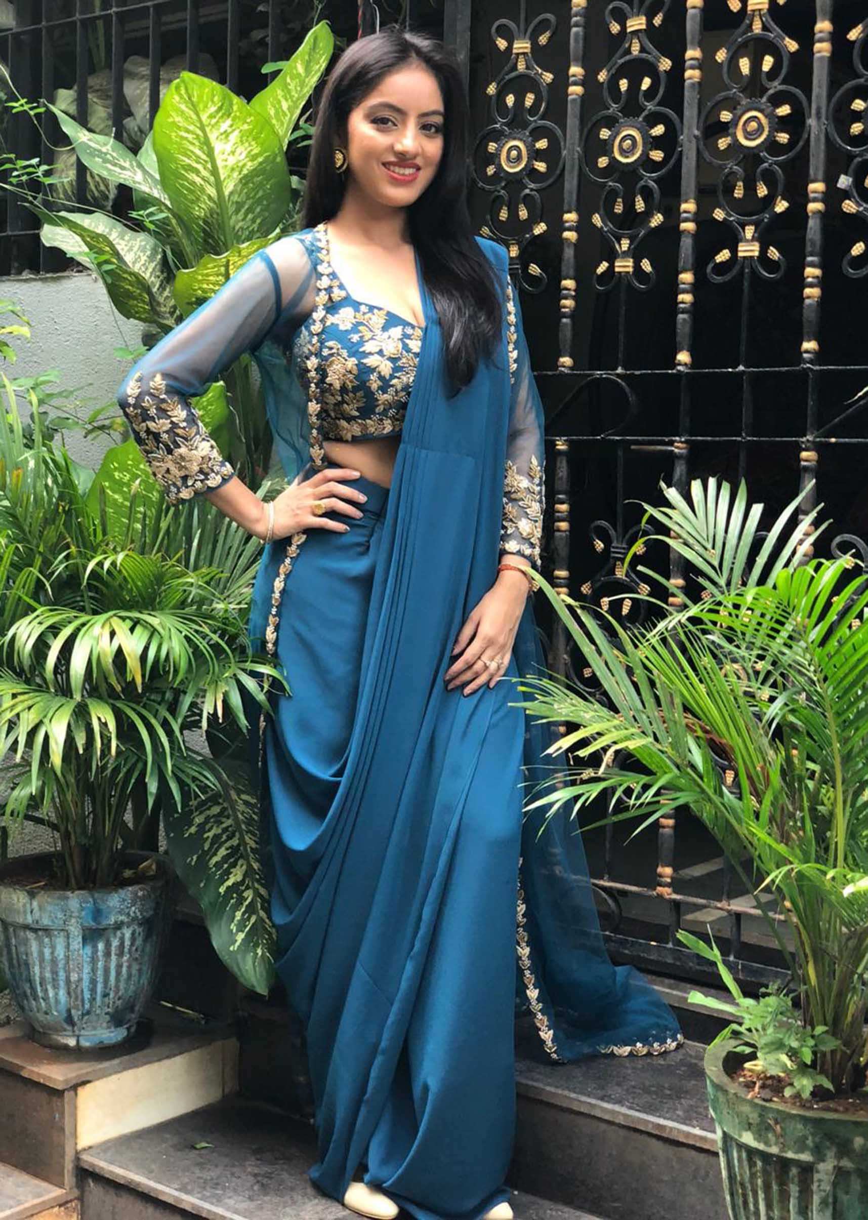 Deepika Singh in Kalki embroidered crop top with draped skirt and jacket 