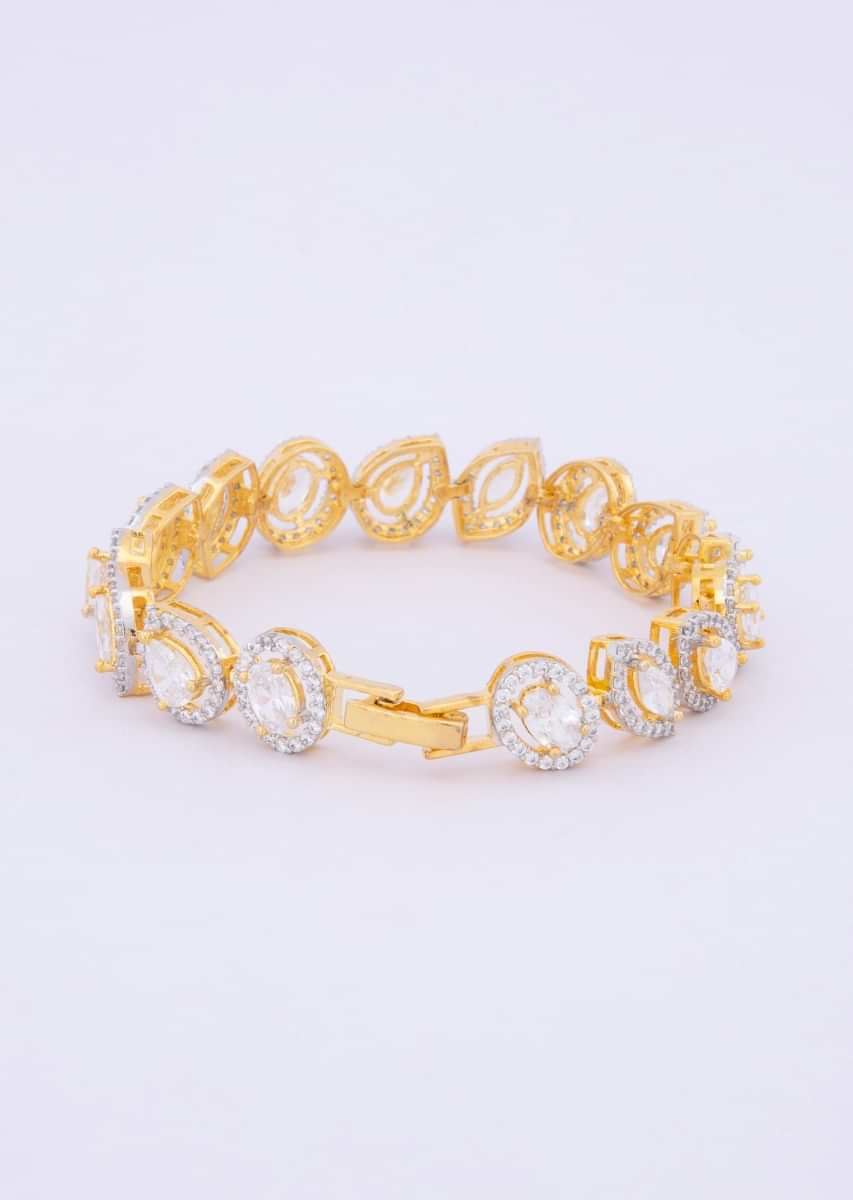  Diamond studded golden bracelet in floral and marquise motif only on kalki