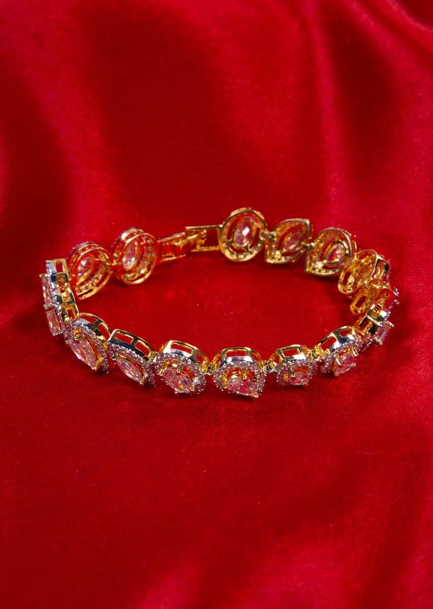  Diamond studded golden bracelet in floral and marquise motif only on kalki