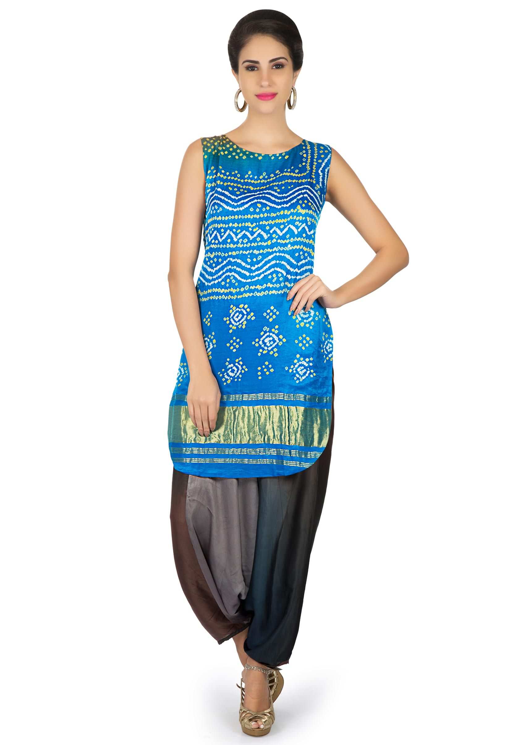 Diva blue satin top in bandhani print matched with Aladdin pants only on Kalki
