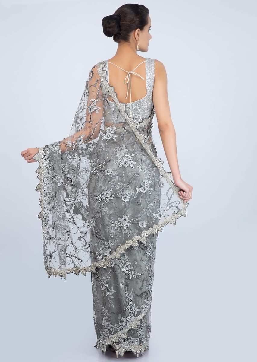 Dove grey hard net saree in floral jaal embroidery only on Kalki