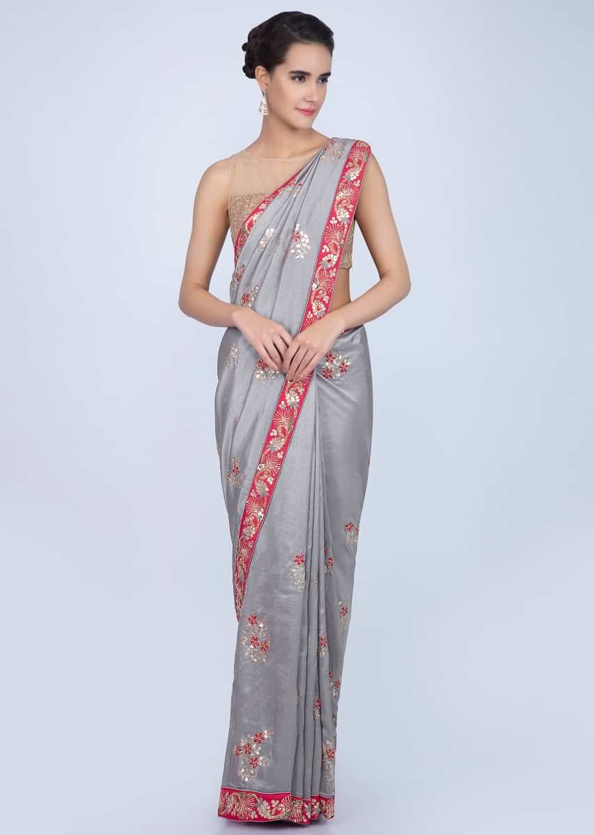 Dove grey silk saree with floral embroidered butti and border only on Kalki